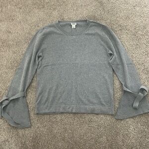 JCrew crewneck long sleeve sweater with bell sleeve detailing.